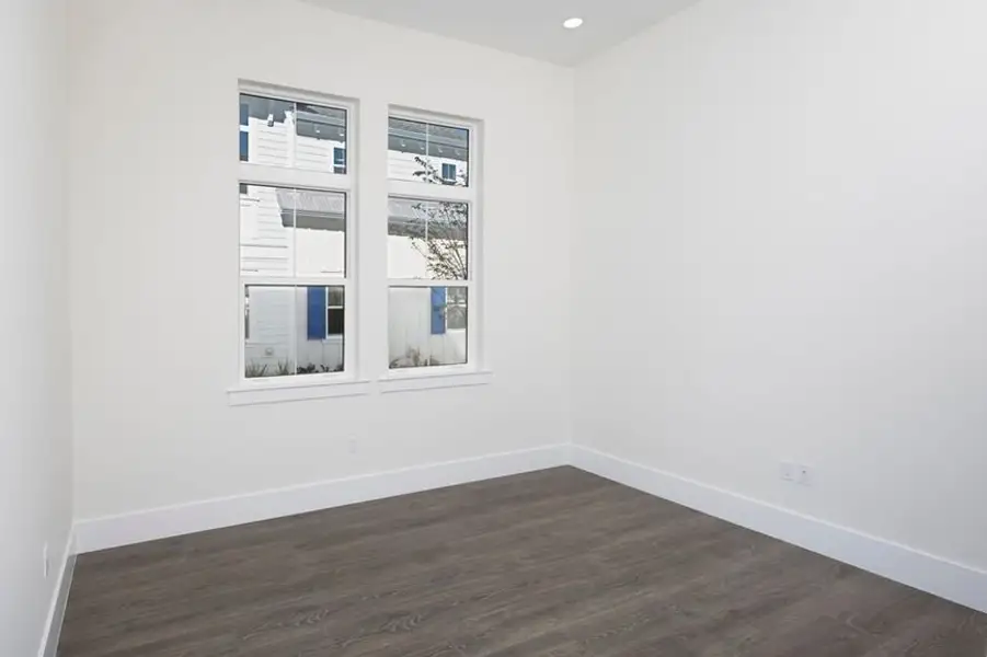Representative unfurnished interior of a home built from the Grand Spinnaker by Minto Communities in Latitude Margaritaville Watersound, Panama City Beach (Image 12).