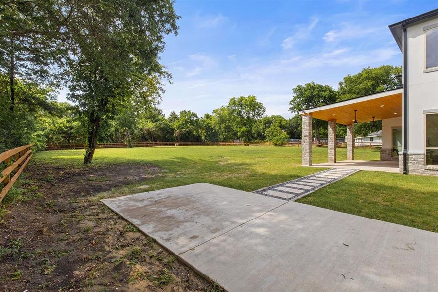 Exterior details and patio area of a home in , Rowlett (Image 24).