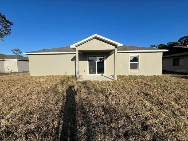 Exterior details and patio area of a home in Palm Coast, Palm Coast (Image 3). Exterior details and patio area of a home in Palm Coast, Palm Coast (Image 3).