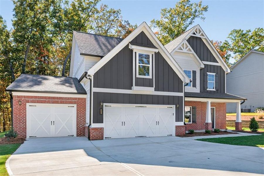 Front exterior of a new home in , Jefferson, GA, highlighting curb appeal (Image 1).