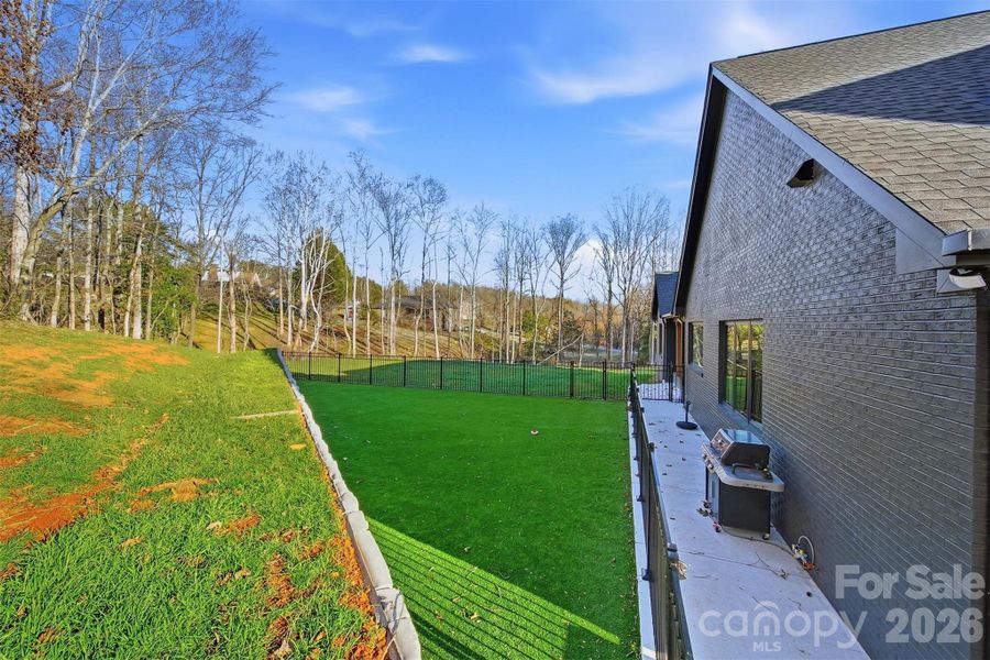 Exterior details and patio area of a home in , Hickory (Image 3).