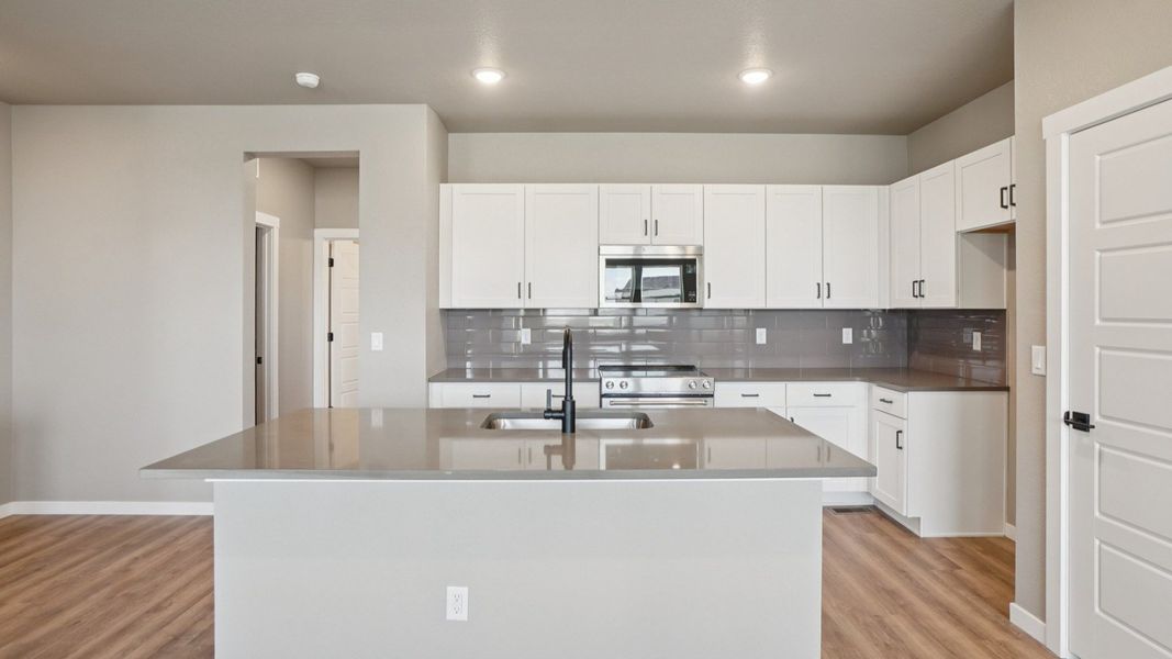 Furnished interior view inside a new home in Windler Townhomes, Aurora (Image 10). Furnished interior view inside a new home in Windler Townhomes, Aurora (Image 10).