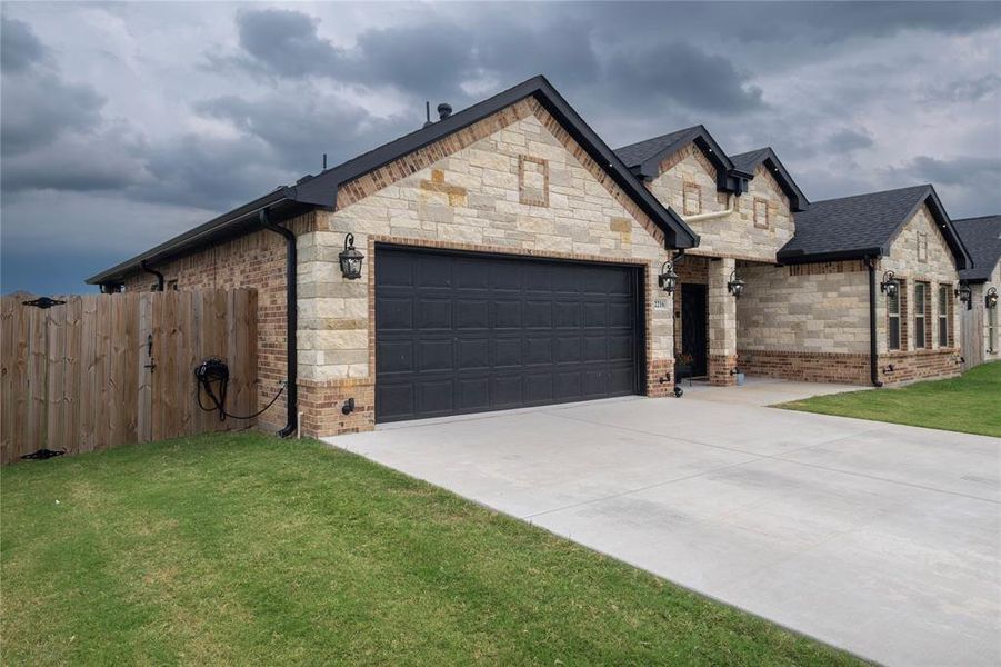 Front exterior of a new home in , Mabank, TX, highlighting curb appeal (Image 1).