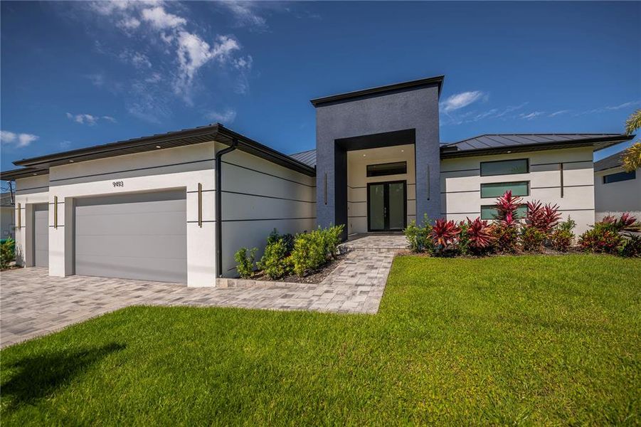 Front exterior of a new home in , Port Charlotte, FL, highlighting curb appeal (Image 27).