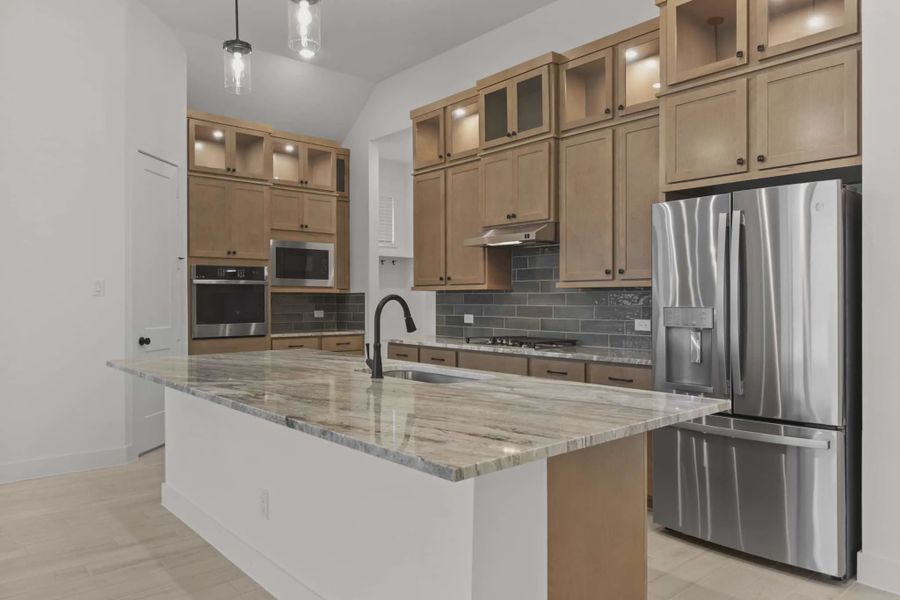 Representative furnished interior of a home built from the Summerton by Chesmar Homes in Prominence 50's, San Antonio (Image 4).