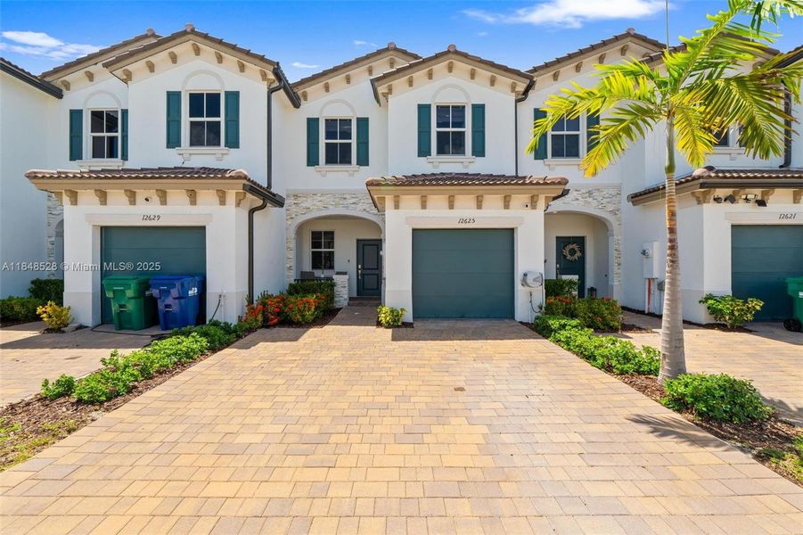 Front exterior of a new home in , Miami, FL, highlighting curb appeal (Image 18).