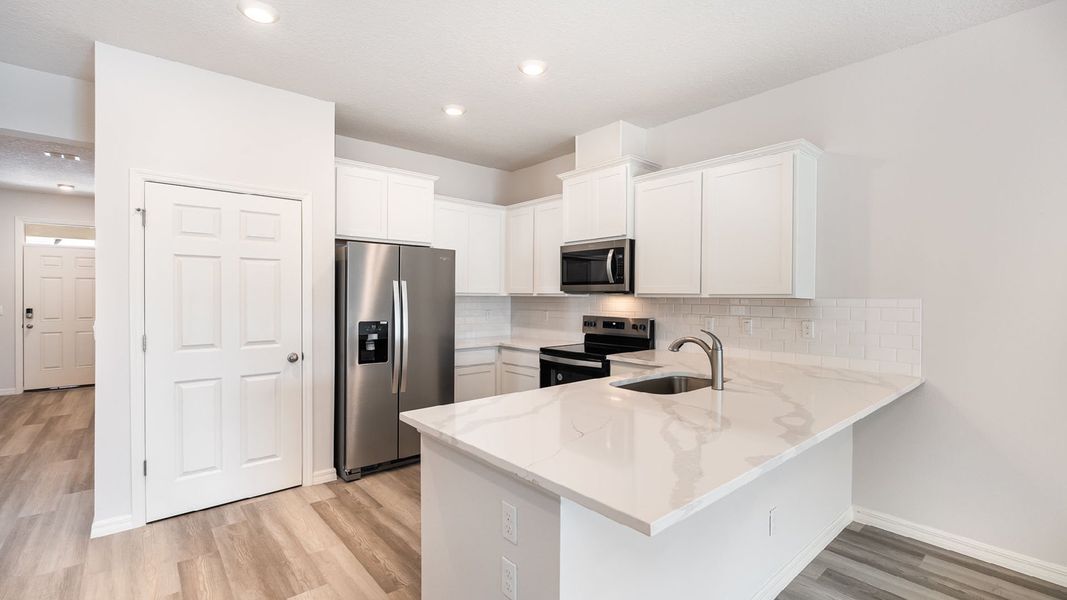 Furnished interior view inside a new home in Orchid Reserve, Sebastian (Image 4).