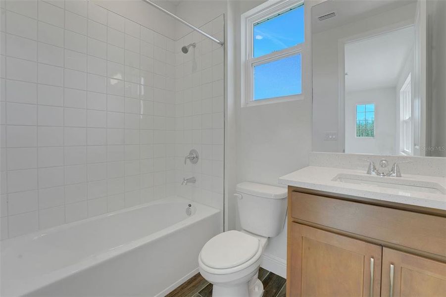 Furnished interior view inside a new home in Angeline, Land O' Lakes (Image 12).