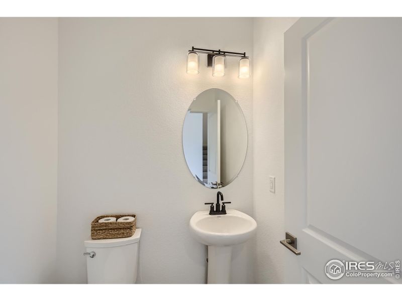 Main level bathroom - Same Floor Plan, Different Model.
