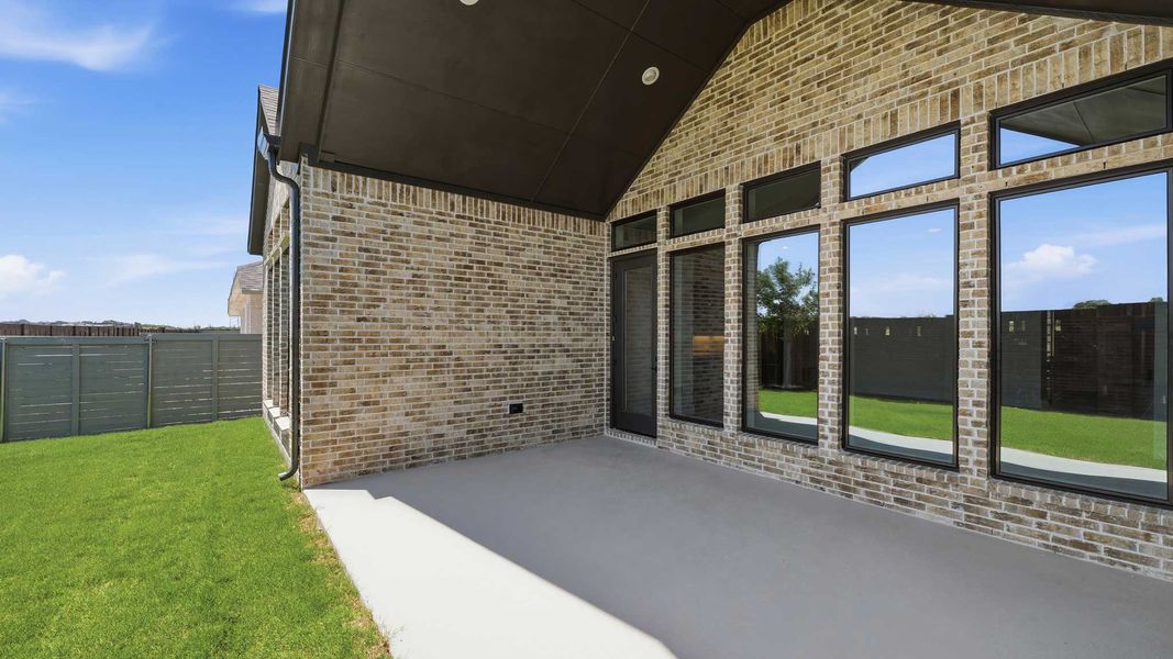 Exterior details and patio area of a home in Landmark, Denton (Image 3). Exterior details and patio area of a home in Landmark, Denton (Image 3).