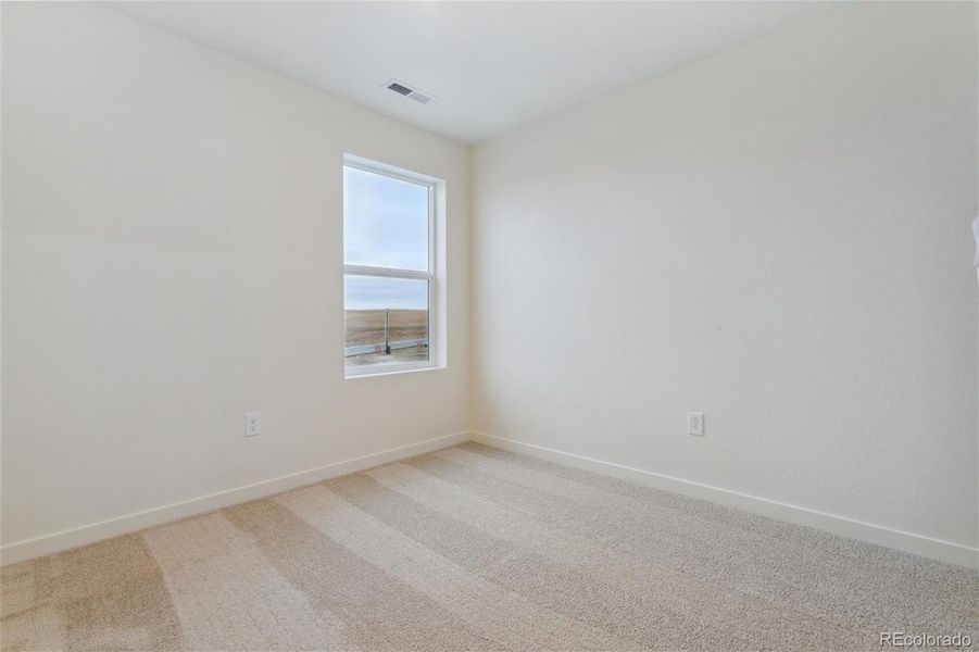 Spacious, unfurnished interior of a new home in The Ridge at Lorson Ranch, Colorado Springs (Image 18).