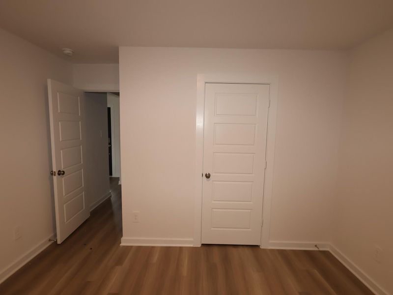 Spacious, unfurnished interior of a new home in Pinewood at Grand Texas, New Caney (Image 10).