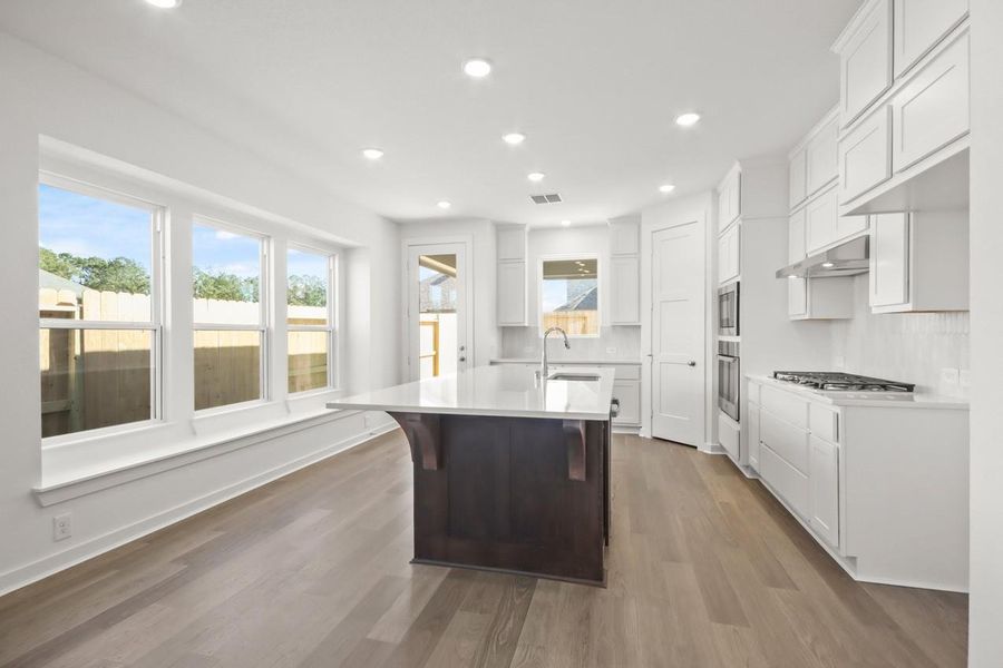 Furnished interior view inside a new home in The Highlands, Porter (Image 9).