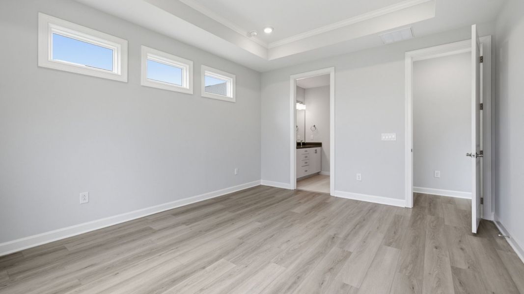Spacious, unfurnished interior of a new home in The Courtyards at Oak Grove, Durham (Image 32).
