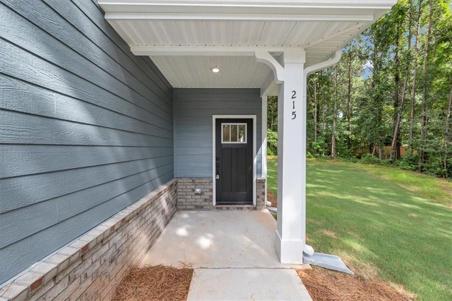 Exterior details and patio area of a home in Canterbury Villas, Carrollton (Image 4).