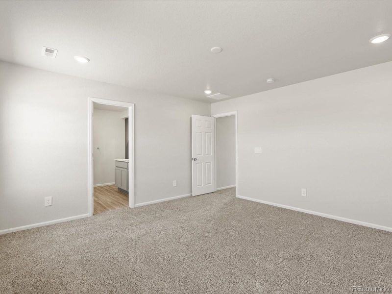 Spacious, unfurnished interior of a new home in Poudre Heights: The Lakes Collection, Windsor (Image 21).