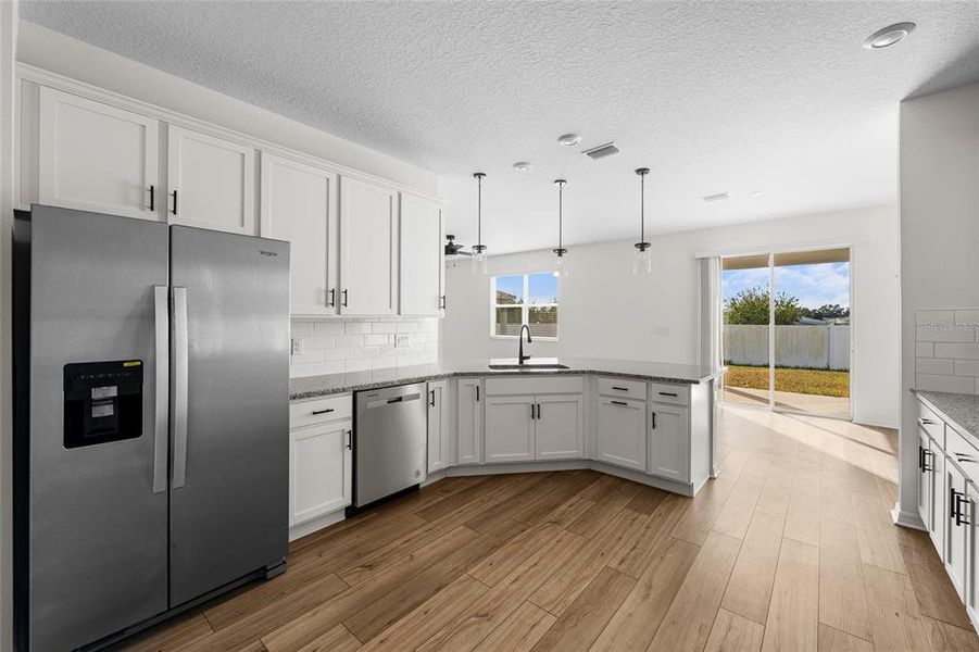 Furnished interior view inside a new home in Heron Bay, Palmetto (Image 6). Furnished interior view inside a new home in Heron Bay, Palmetto (Image 6).