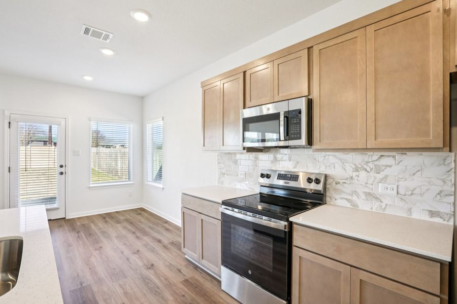 Furnished interior view inside a new home in Cool Water at Sonterra, Jarrell (Image 8).