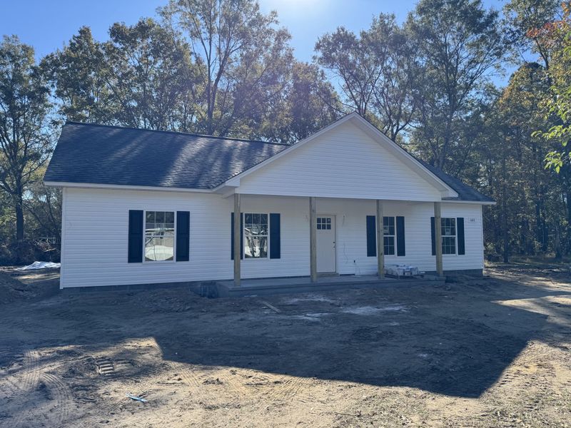 Exterior details and patio area of a home in , Cottageville (Image 13).