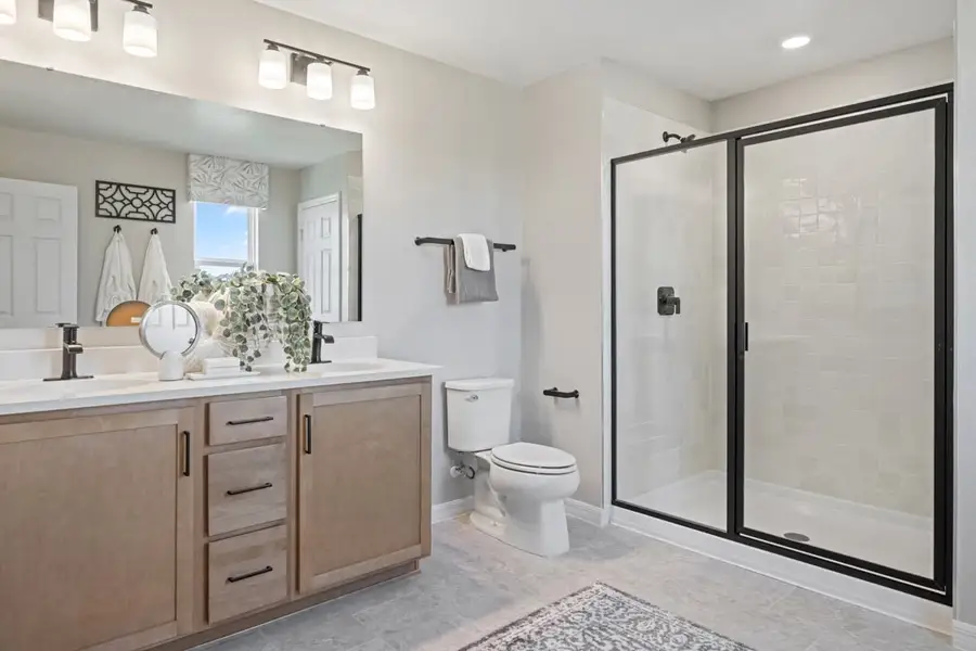 Walk-in shower at primary bath