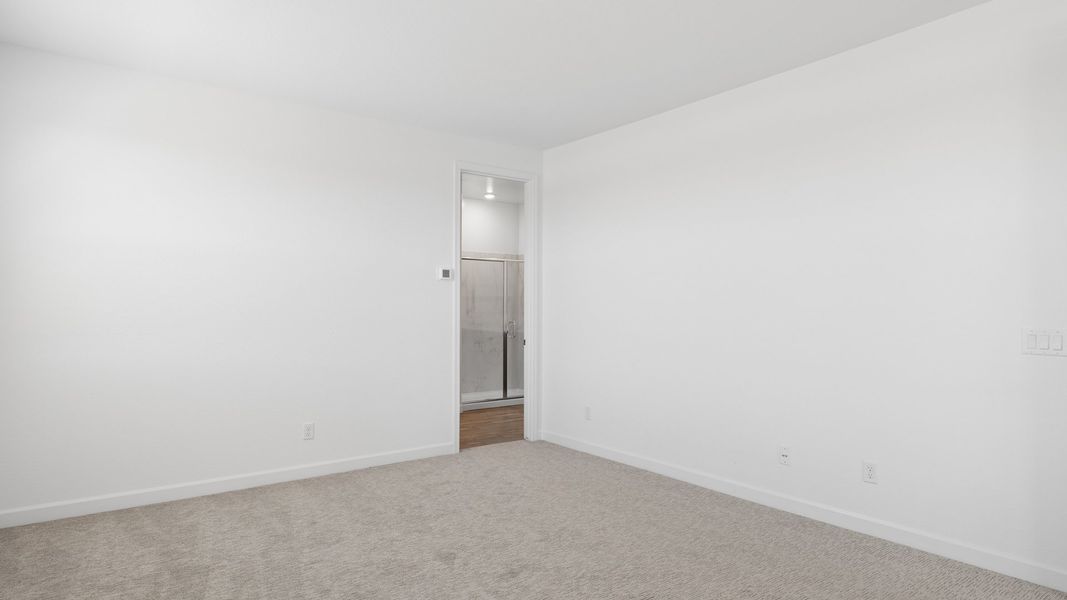 Spacious, unfurnished interior of a new home in Radiance at Superstition Vistas, Apache Junction (Image 27).