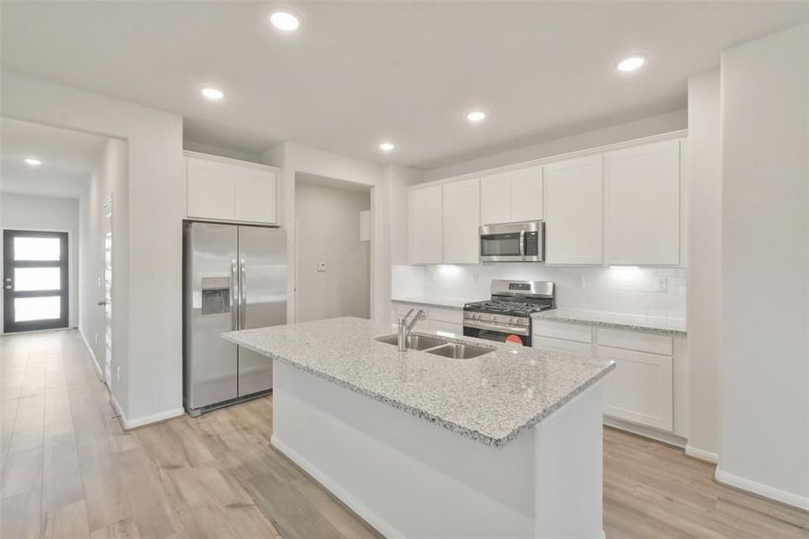 Furnished interior view inside a new home in Lakes at Black Oak, Magnolia (Image 9).