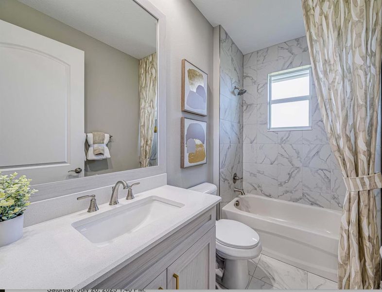 Furnished interior view inside a new home in Tesoro Club, Port St. Lucie (Image 2).