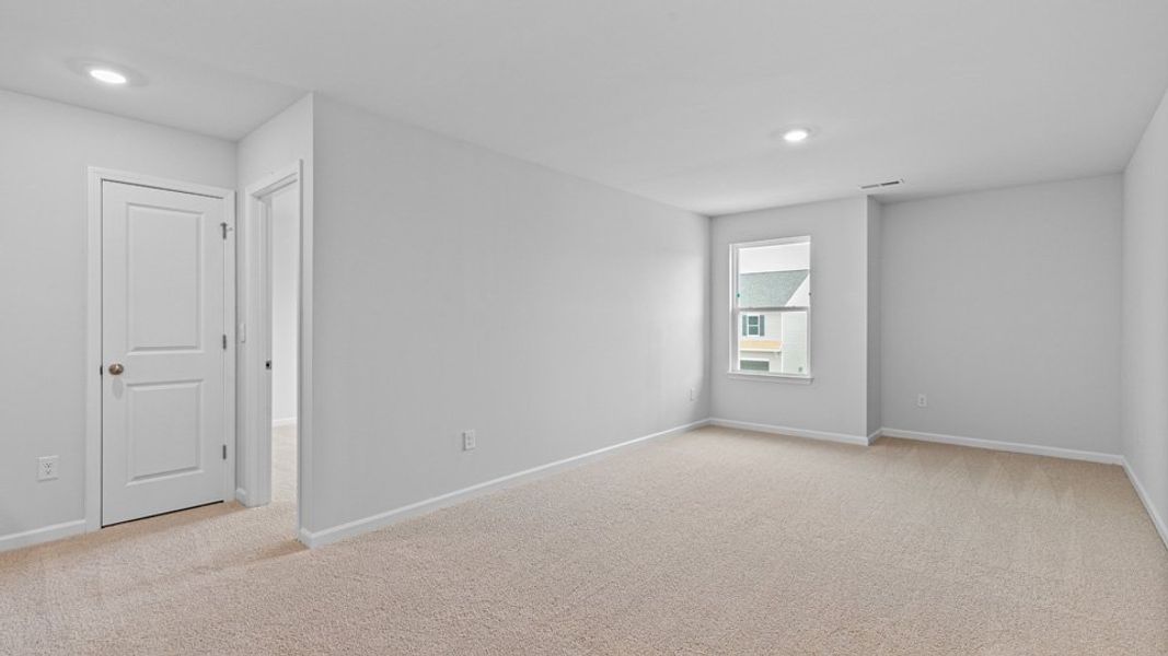 Spacious, unfurnished interior of a new home in The Reserve at Stoney Creek, Whitsett (Image 16).