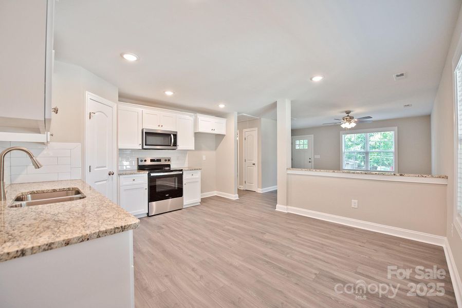 Furnished interior view inside a new home in , Concord (Image 5). Furnished interior view inside a new home in , Concord (Image 5).