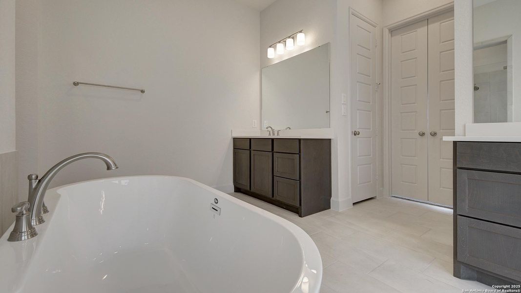 Furnished interior view inside a new home in Stevens Ranch 55', San Antonio (Image 13).