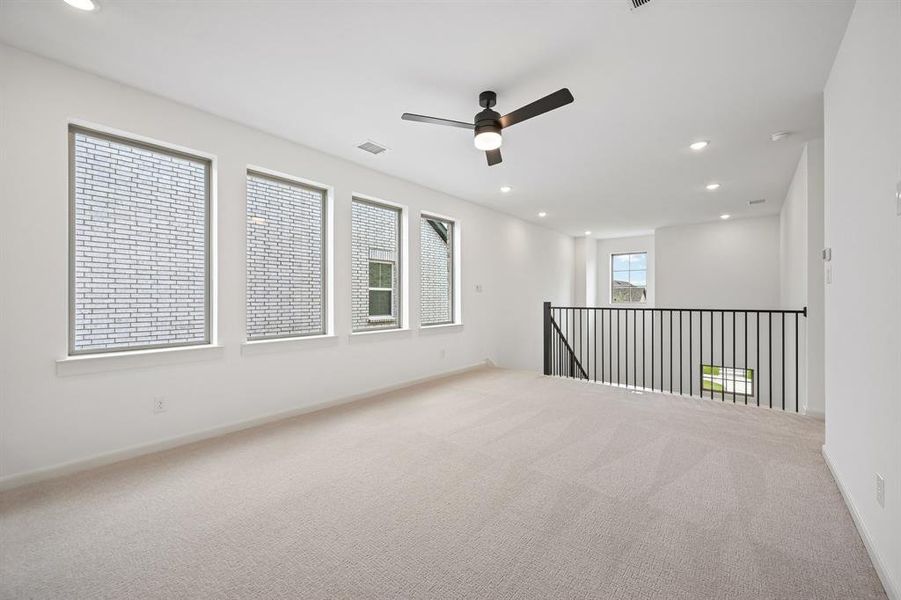 This light, bright and airy game room is the perfect place to host those big game day parties!
