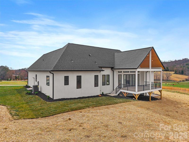 Exterior details and patio area of a home in , Fletcher (Image 29).