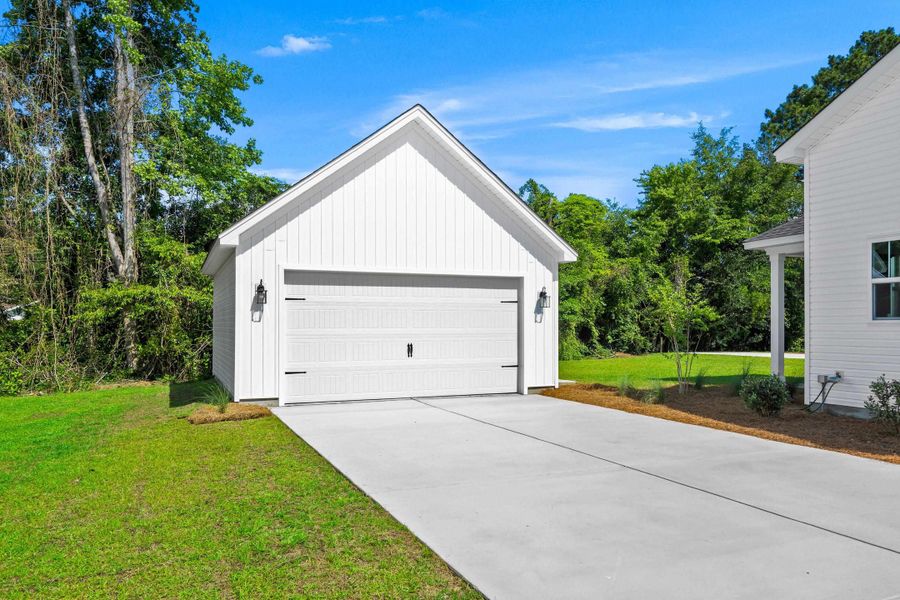 Front exterior of a new home in Downtown Loris Homes, Loris, SC, highlighting curb appeal (Image 2). Front exterior of a new home in Downtown Loris Homes, Loris, SC, highlighting curb appeal (Image 2).