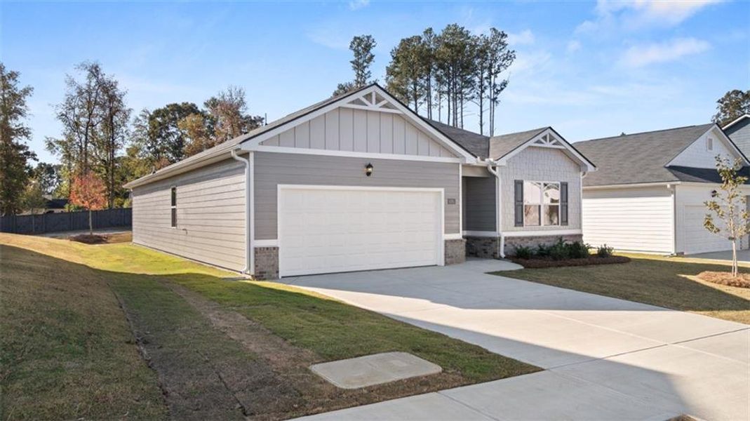 Front exterior of a new home in Jackson Landing, Jefferson, GA, highlighting curb appeal (Image 2).