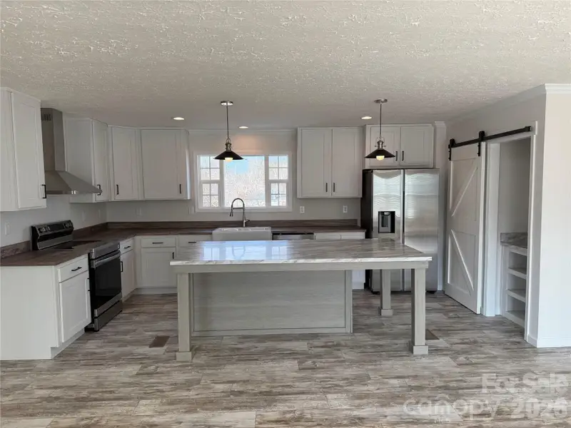 Furnished interior view inside a new home in , Statesville (Image 4).
