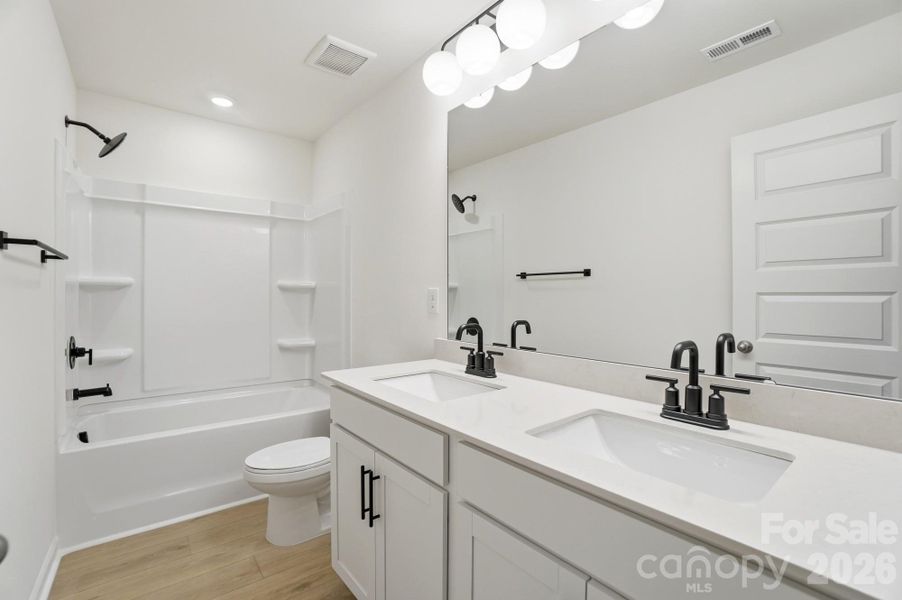 Furnished interior view inside a new home in Wellington Pointe Executive, Monroe (Image 18).