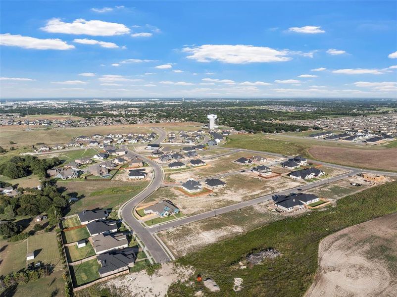 Aerial overview of property's location with nearby suburban area Aerial overview of property's location with nearby suburban area