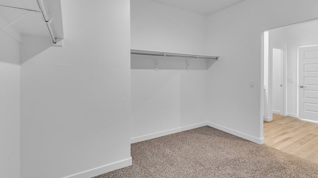 Spacious, unfurnished interior of a new home in The Oasis at Rocking K, Vail (Image 28).