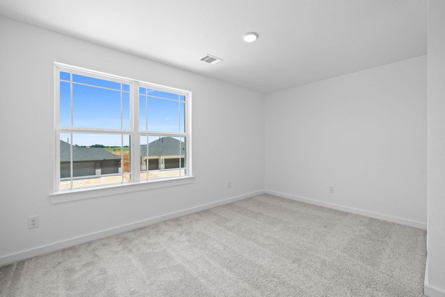 Each bedroom boasts generous square footage, offering plenty of space for a cozy reading nook, a playful area for kids, or a home office that inspires productivity.