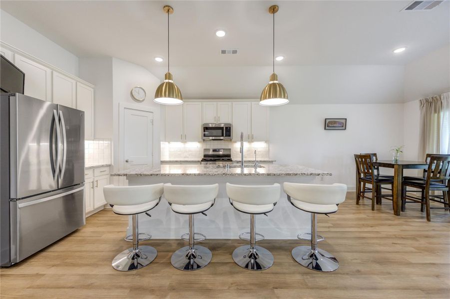 Furnished interior view inside a new home in Marvida, Cypress (Image 12).
