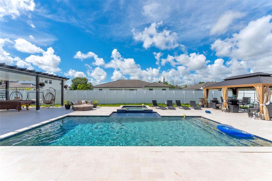 Front exterior of a new home in , Homestead, FL, highlighting curb appeal (Image 18). Front exterior of a new home in , Homestead, FL, highlighting curb appeal (Image 18).