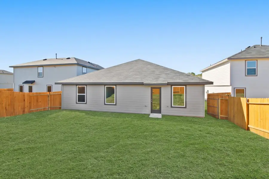 Exterior details and patio area of a home in Lexington Heights, Willis (Image 3).