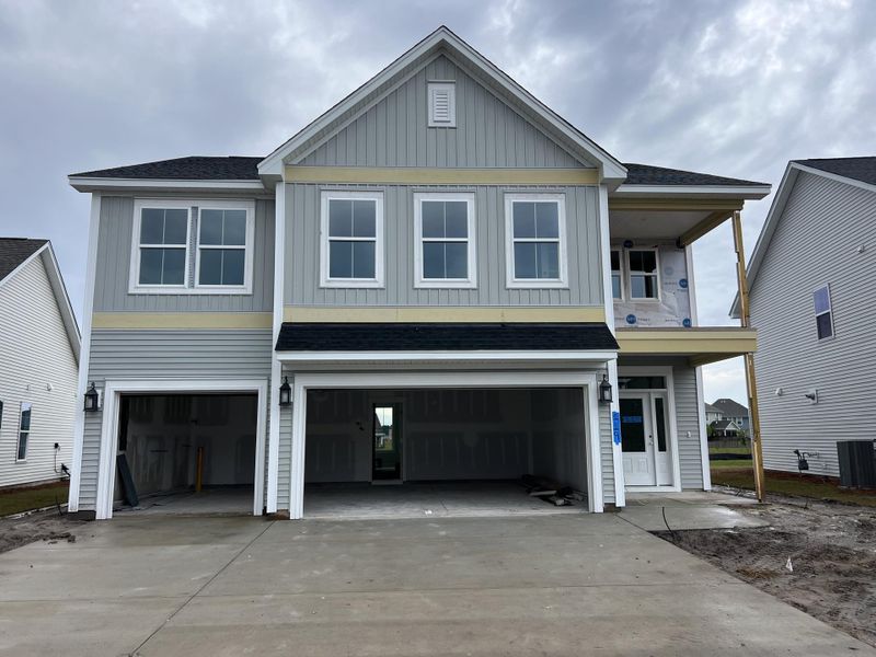 Front exterior of a new home in Lochton, Summerville, SC, highlighting curb appeal (Image 1). Front exterior of a new home in Lochton, Summerville, SC, highlighting curb appeal (Image 1).