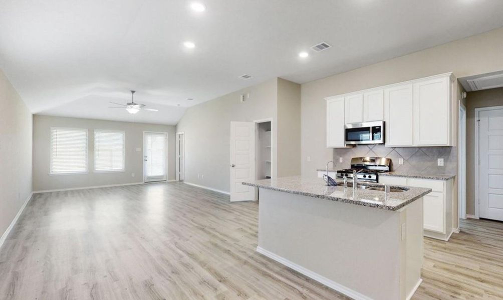 Furnished interior view inside a new home in Mustang Crossing, Alvin (Image 9).