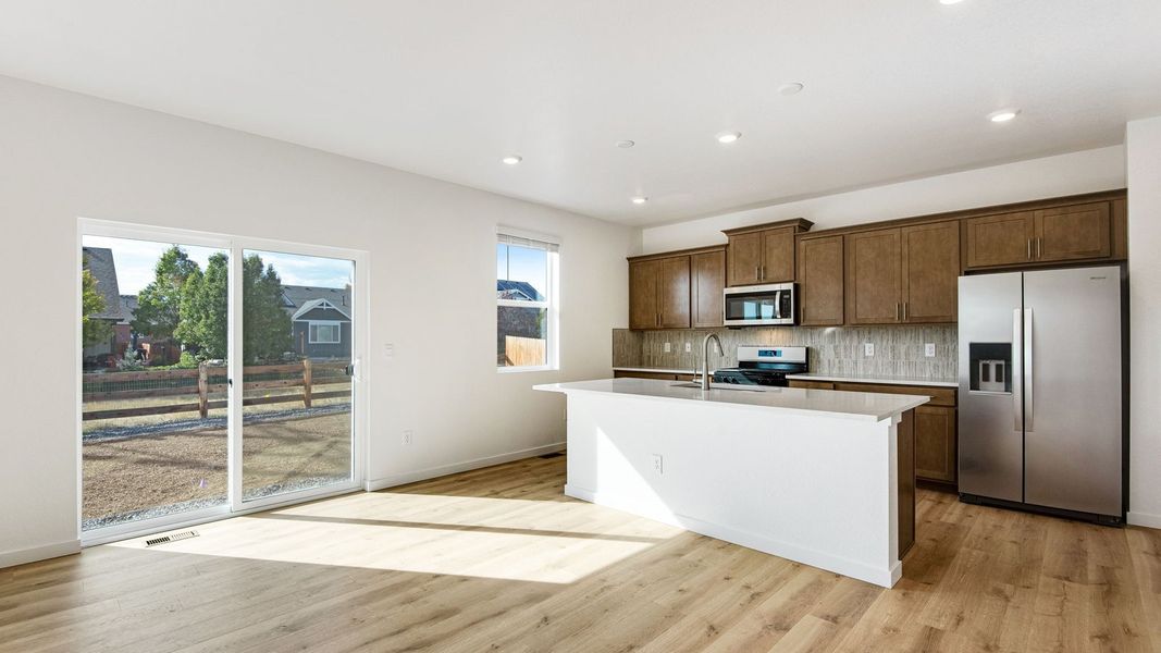 Furnished interior view inside a new home in Trails at Crowfoot, Parker (Image 5).