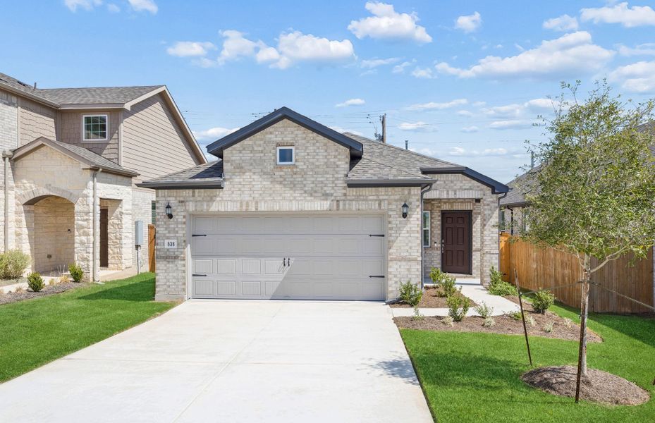 Front exterior of a new home in Crosswinds, Kyle, TX, highlighting curb appeal (Image 16).