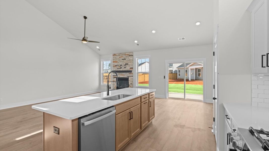 Well-designed kitchen with a center island and tasteful finishes that elevate everyday living