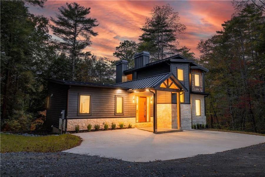 Front exterior of a new home in , Cherry Log, GA, highlighting curb appeal (Image 1).