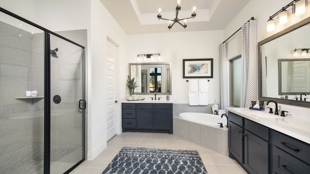 Representative furnished interior of a home built from the 3578W by Perry Homes in Lakes of Cane Island, Katy (Image 36).