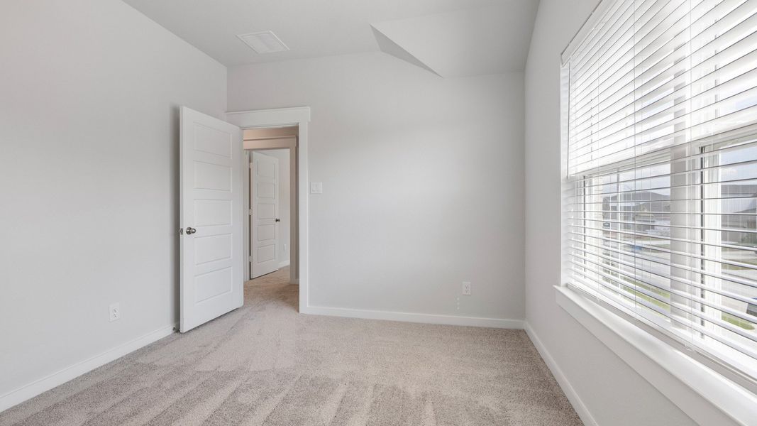 Furnished interior view inside a new home in Mostyn Springs, Magnolia (Image 31).